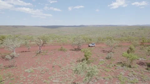 Isolated Car Driving On Remote Red Dirt Track In Australia Stock Footage 346923467