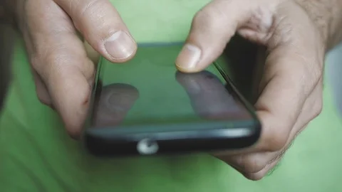 Isolated cell phone hands scrolling news feed networking Stock Footage 80460696
