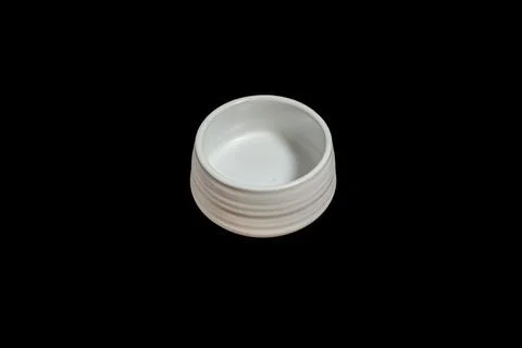 Isolated Ceramic mug of tea on black background. Stock Photos