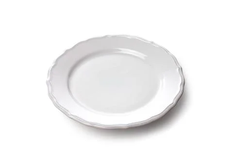 Isolated ceramic plate flower shape top view on white background Foto stock