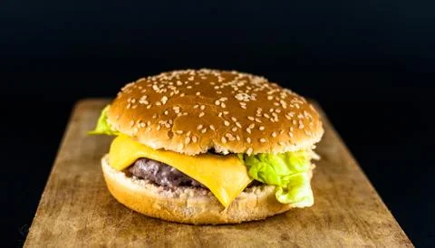 Isolated cheeseburger on neutral background Stock Photos