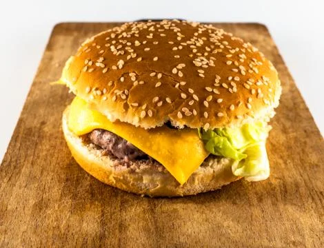 Isolated cheeseburger on neutral background Stock Photos
