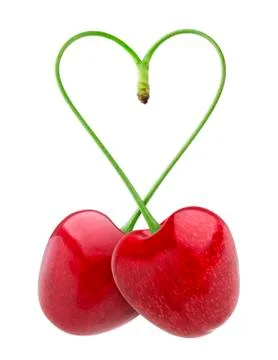 Isolated cherries. Heart shape from two cherries over white background Foto stock