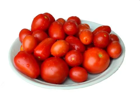 Isolated cherry tomatoes with white background on white plate Stock Photos