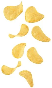 Isolated chips. Falling potato chips isolated on white background with clipping Stock Photos