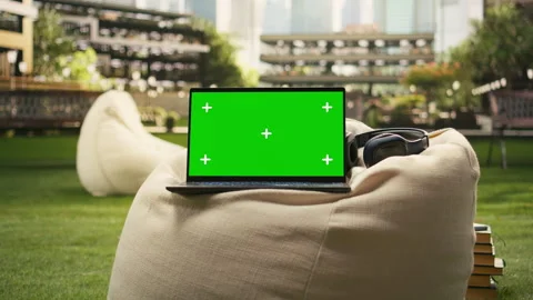 Isolated chroma key laptop placed on campus beanbag Stock Footage 340961986