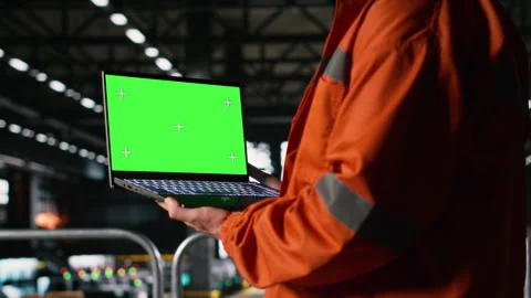 Isolated chroma key, laptop screen, engineer in machinery hall, heavy equipment Stock Footage 330030442