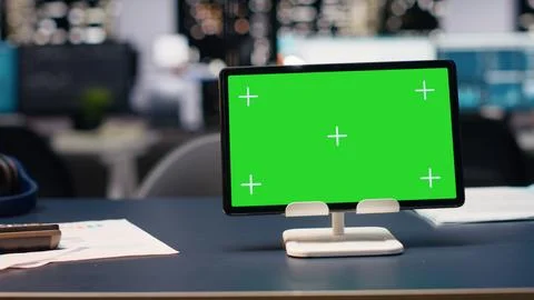 Isolated chroma key screen tablet with empty office space with glass walls Stock Photos