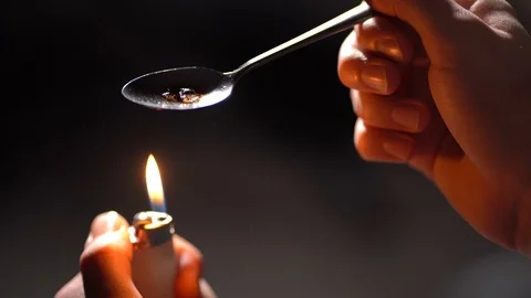 heating up my spoon to smoke some pot : r/facepalm