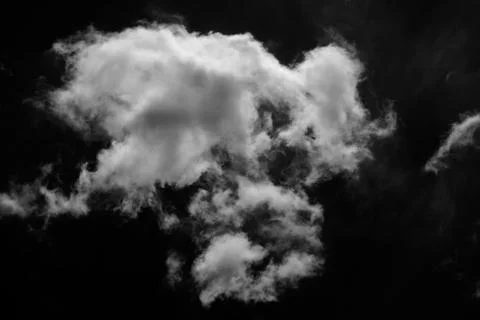 Isolated clouds on a plain black background. Stockfoto's