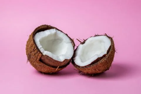 Isolated coconut on a pink background.  Stock Photos