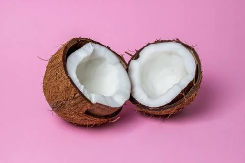 Isolated coconut on a pink background.  Stock Photos