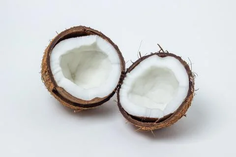 Isolated coconut on a white background. Two halves of a coconut.  Stock Photos