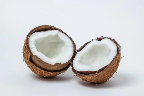 Isolated coconut on a white background. Two halves of a coconut.  Stock Photos