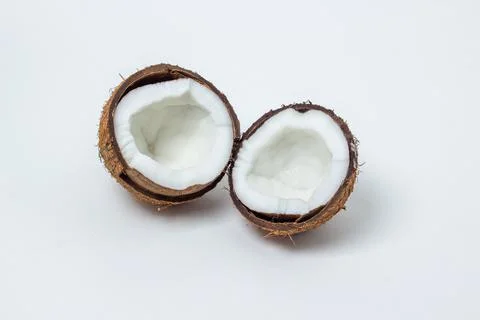 Isolated coconut on a white background. Two halves of a coconut.  Stock Photos