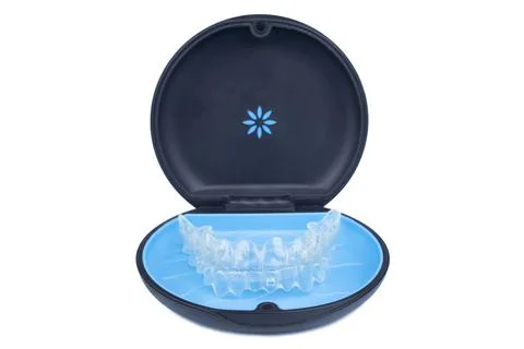Isolated container with transparent invisalign aligner retainers or removable Stock Photos
