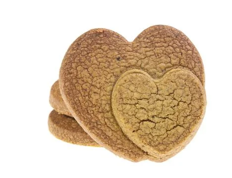 Isolated cookies with connected heart pattern Isolated cookies with two co... Stock Photos