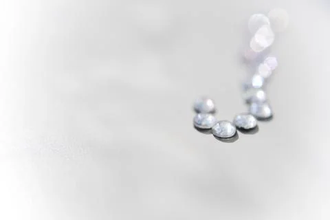 Isolated crystals on the plain background with the side light 스톡 사진