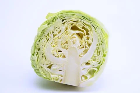 Isolated cut half single of green cabbage Stock Photos