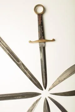 Isolated dagger with assorted blades of weapons Stock Photos