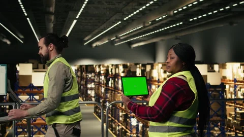 Isolated display, logistics staff member, tablet screen, warehouse platform, Stock Footage 330378599