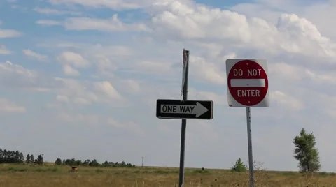 Isolated Do Not Enter and One Way Road Signs With Cloudy Sky Background Stock Footage 54418414