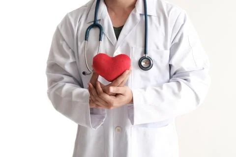 Isolated doctor holding red heart Stock Photos