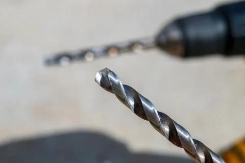 The Isolated Drill Bits with the Gray Ground Background Stock Photos