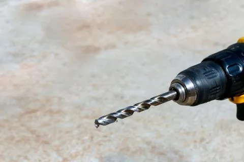 The Isolated Drill Bits with the Gray Ground Background Stock Photos