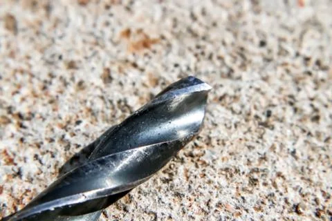 The Isolated Drill Bits with the Gray Ground Background Stock Photos