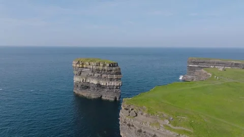 Isolated Dun Briste Sea Stack Beside Sheer Green Headland, Aerial. Ireland R Stock Footage 342666253