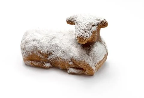 Isolated Easter Sweet Lamb Pound Cake Sprinkled With Powdered Sugar On White Foto stock