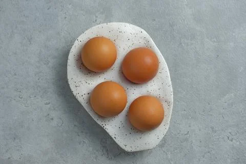 Isolated Eggs on gray background. Telur ayam Foto stock