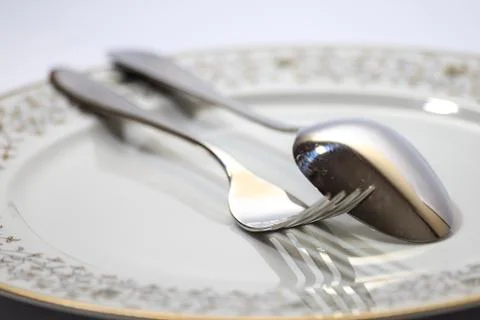 Isolated elegant Fork, spoon and plate for design Stock-Fotos