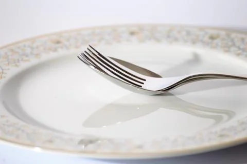Isolated elegant Fork, spoon and plate for design Foto stock