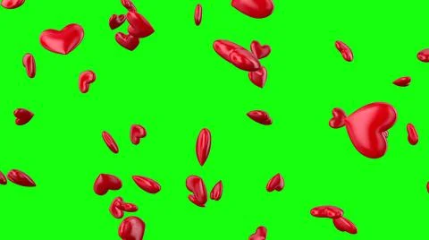 Isolated falling red hearts on a green background. Decoration for marriage, l Stock Photos