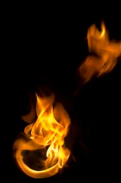Isolated fire flames on black background, darkness Illustrazione stock