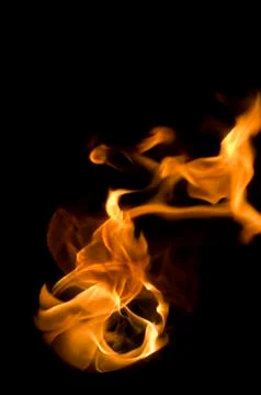Isolated fire flames on black background, darkness Illustrazione stock