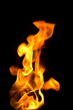 Isolated fire flames on black background, darkness Illustrazione stock