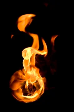 Isolated fire flames on black background, darkness Stock Illustration