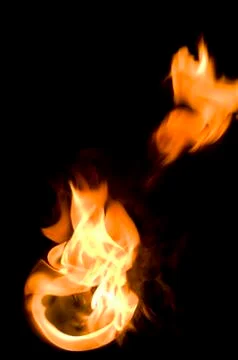 Isolated fire flames on black background, darkness Stock Photos