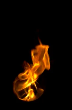 Isolated fire flames on black background, darkness Stock Photos