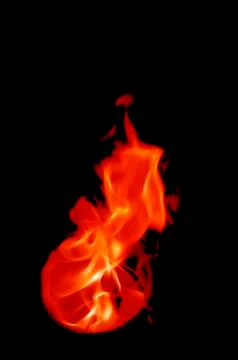 Isolated fire flames on black background, darkness Foto stock