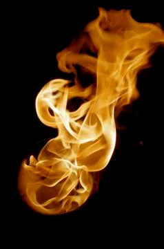 Isolated fire flames on black background, darkness Stock Photos