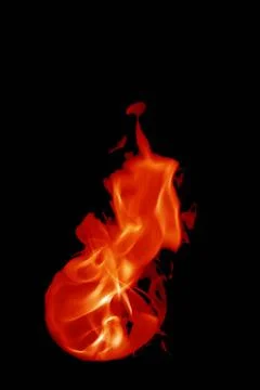 Isolated fire flames on black background, darkness fire with a black backg... Foto stock