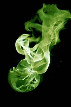 Isolated fire flames on black background, darkness greenish fire with a bl... Stock Photos