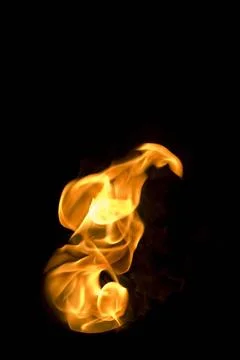 Isolated fire flames on black background, darkness fire with a black backg... Foto stock