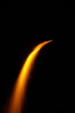 An isolated firework trace on black background Stock Photos