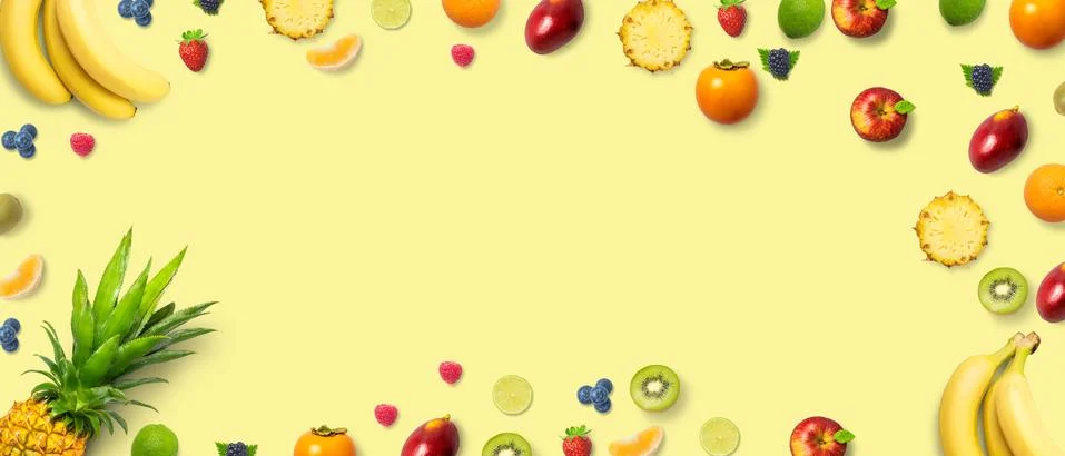 Isolated flat top view of different types of fruits on a soft yellow backgrou Stock Photos