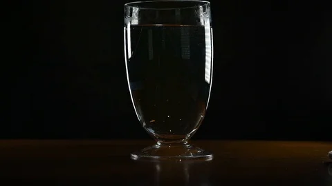 Isolated Fruit falling into large glass vase in slow motion 120fps down to 24 Stock Footage 126127090